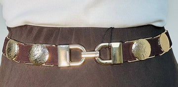 Cintura completamente  elasticizzata con inserti  dorati a cerchio